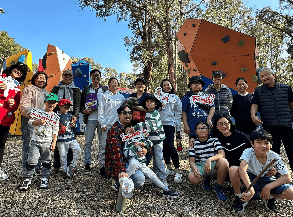 Viangelic support worker and participant smiling together